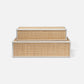 Set of two woven storage boxes with white frames on a light gray background