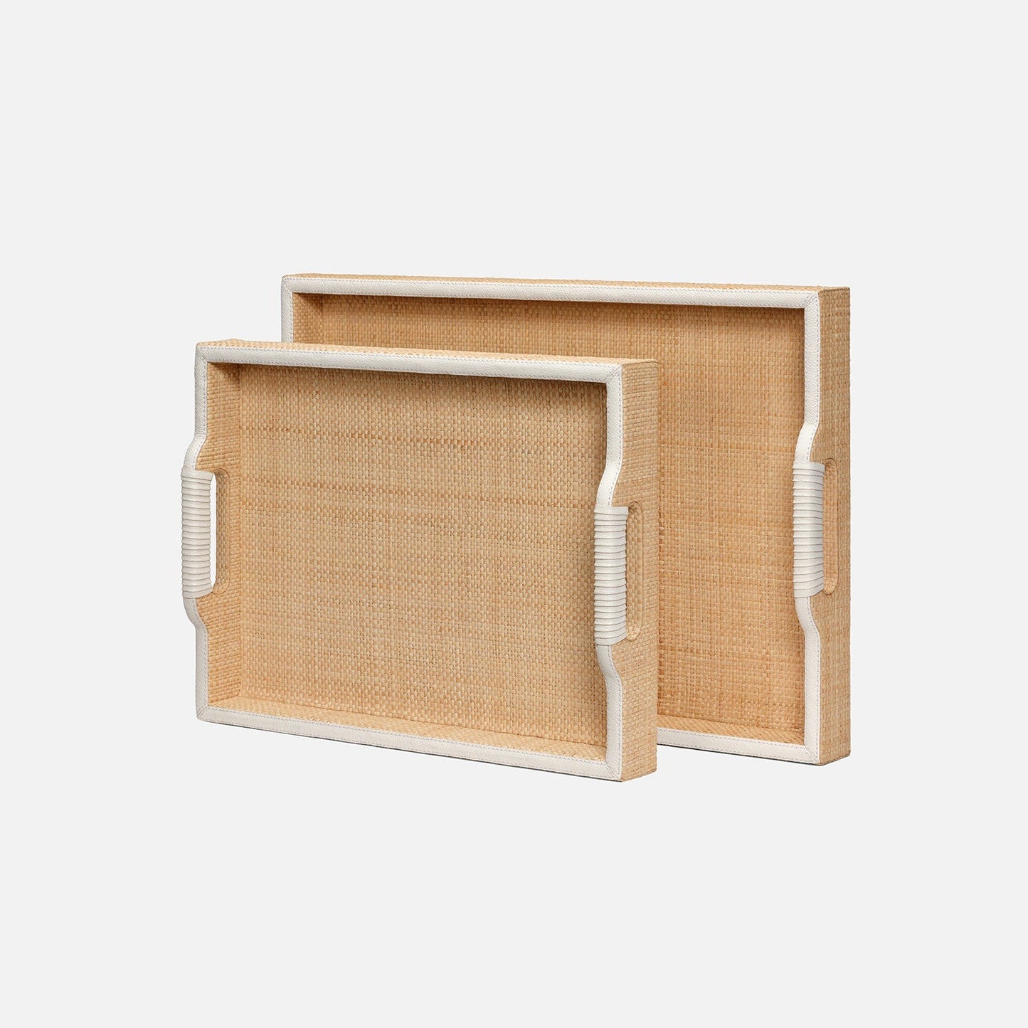 Two woven trays with white frames on a light beige background