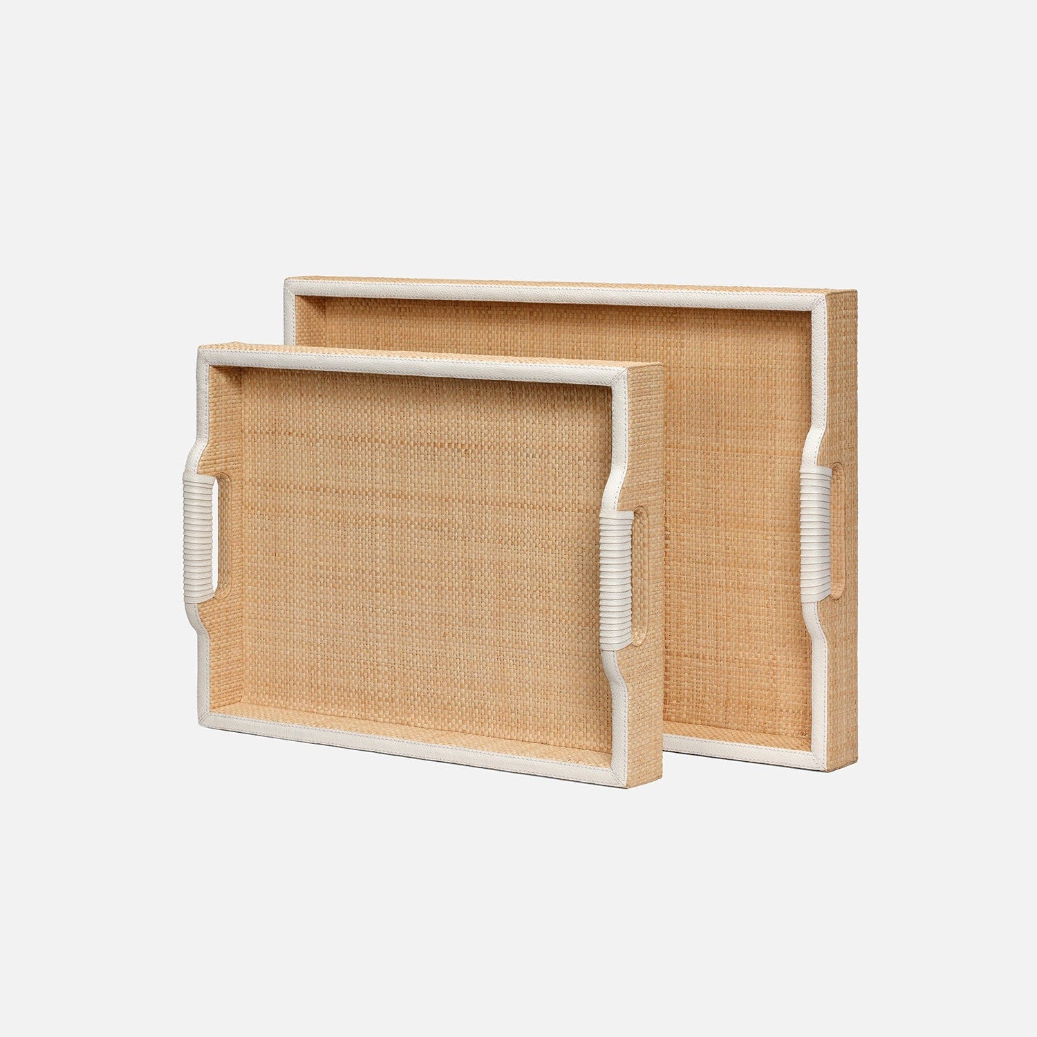 Two woven trays with white frames on a light beige background