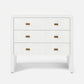 White dresser with gold handles on a white background