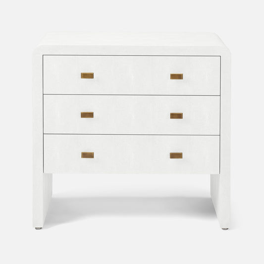 White dresser with gold handles on a white background