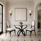 A dining room scene featuring a round glass-top table with a sculptural black branch-like base, two black chairs with cream upholstery, and a large abstract framed artwork on the wall above. The room has cream walls, black-and-white tiled flooring, and wall-mounted sconces.