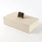 Beige jewelry box with a brush on a white background