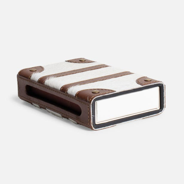 Rectangular object with striped pattern and brown accents on a white background