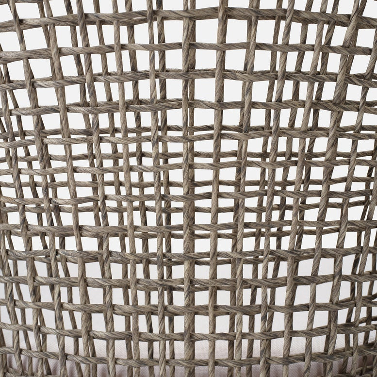 Close-up of woven material with a neutral color on a white background