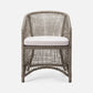 Wicker chair with a white cushion on a white background