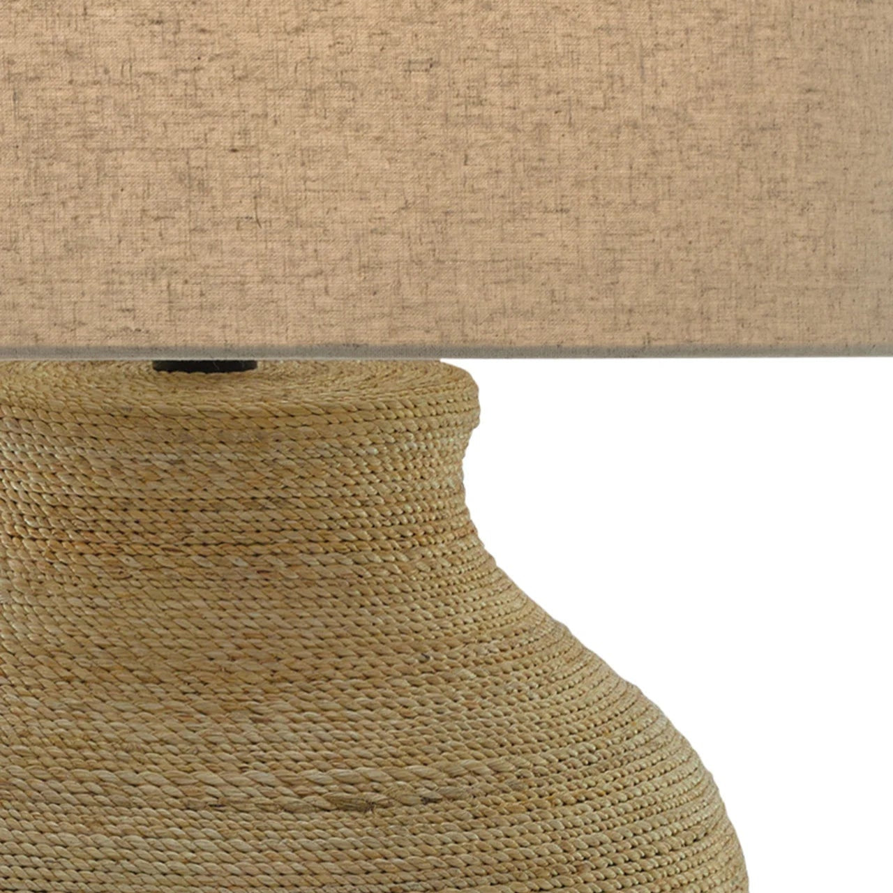 Close-up of a textured lamp with a natural finish on a white background