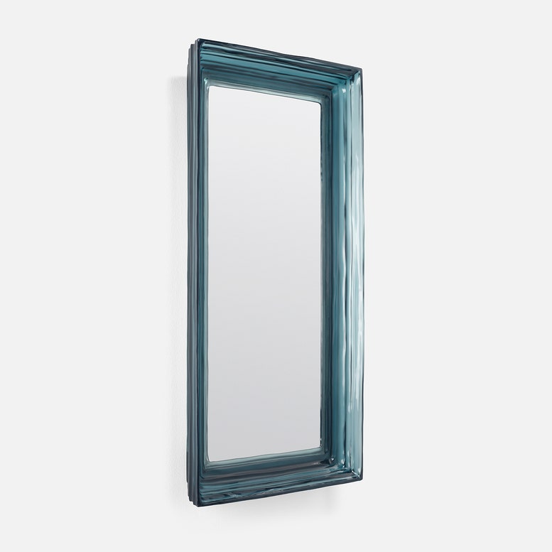 Rectangular mirror with a teal frame on a white background