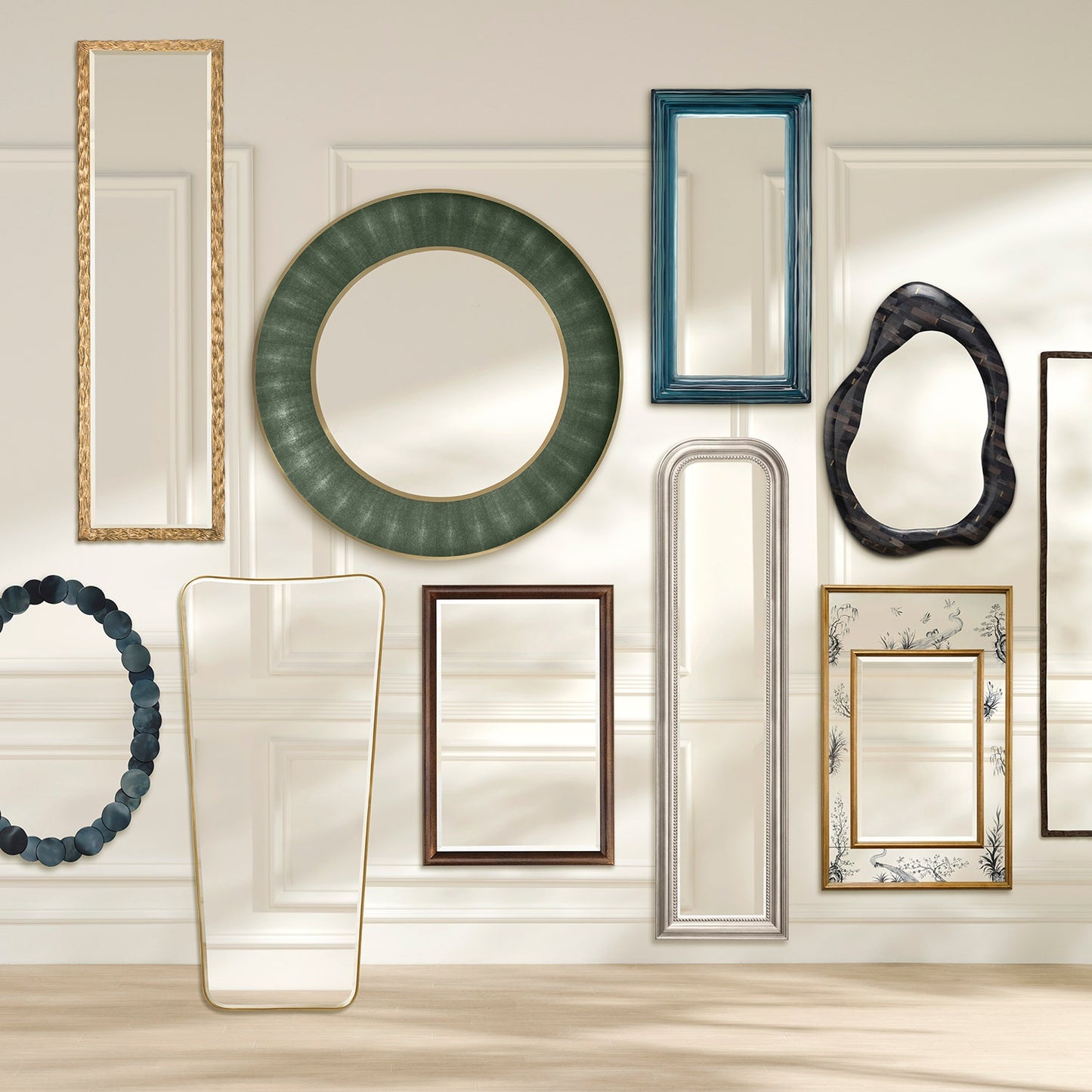 Collection of various mirrors with different frames on a wall.