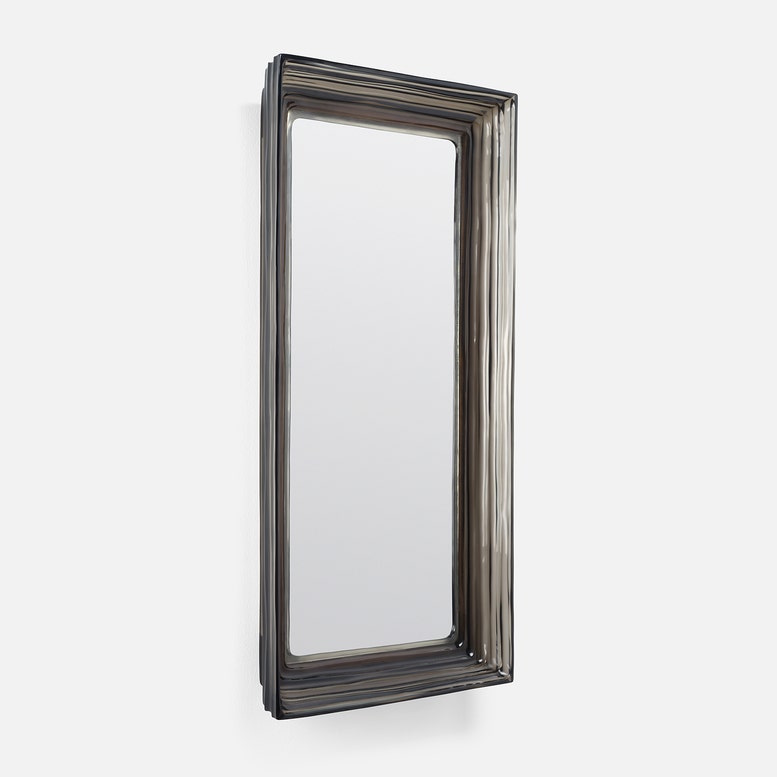 Rectangular mirror with a dark frame on a white background
