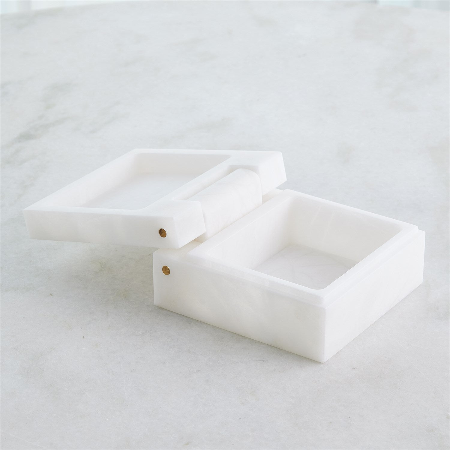 White ceramic dish on a light gray surface