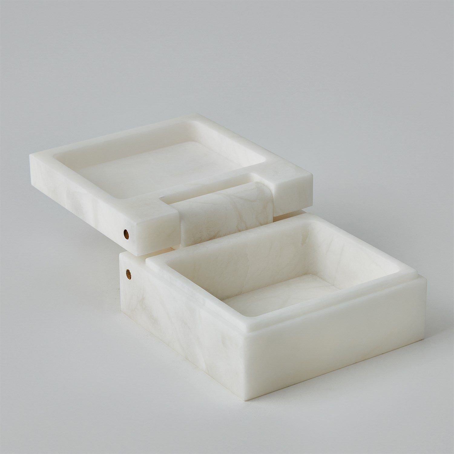 White marble jewelry box on a light gray background