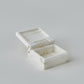 Marble jewelry box on a light gray background