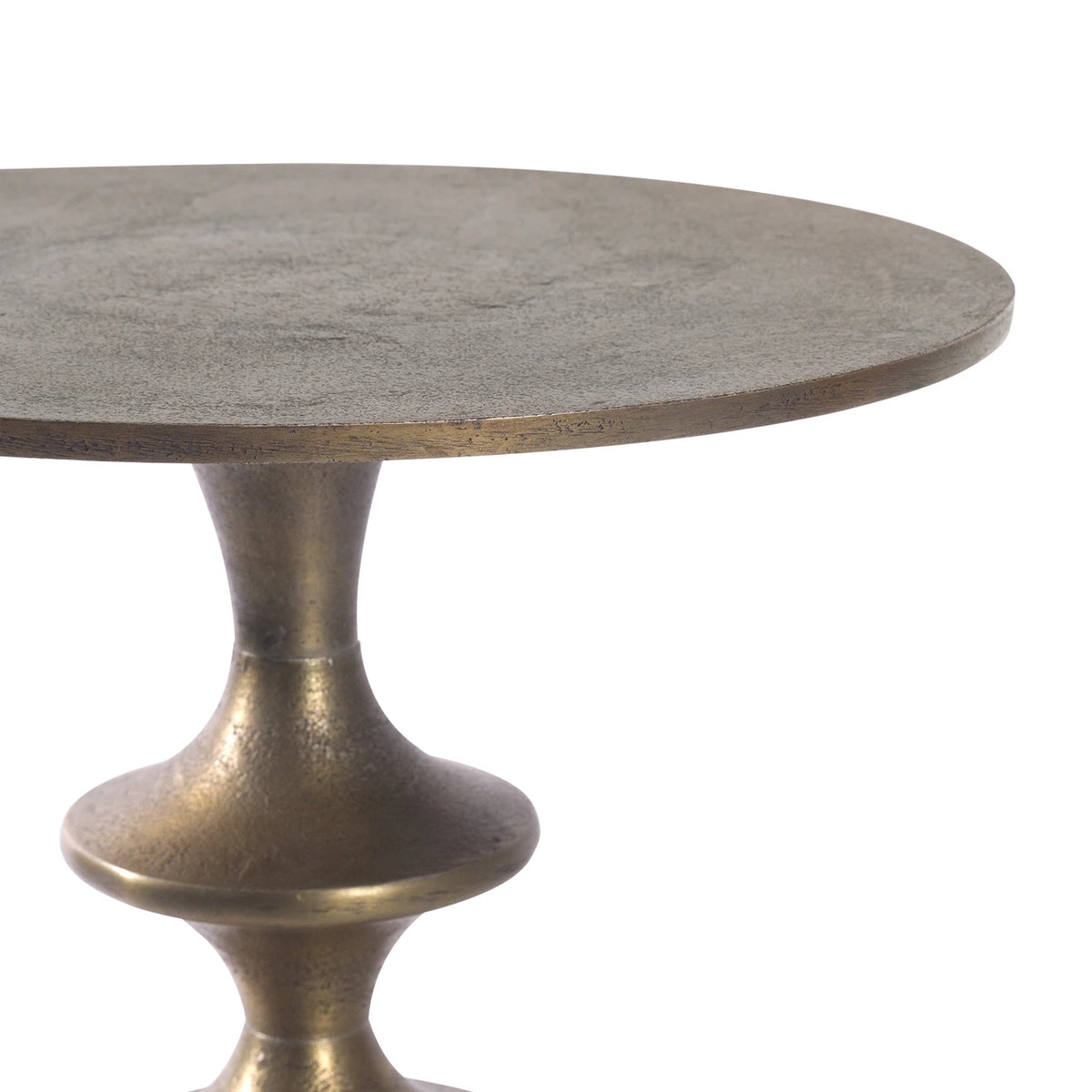 Round table with a textured surface and metallic base on a white background