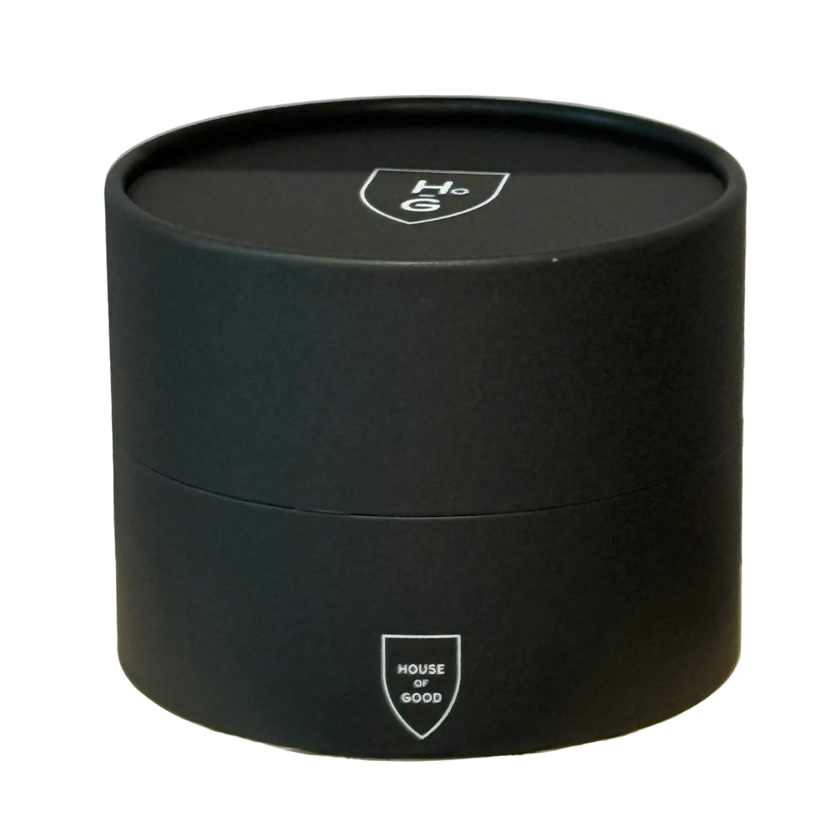 Black circular container with 'House of Goods' logo on a white background