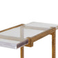 Glass-top coffee table with gold decorative frame on a white background