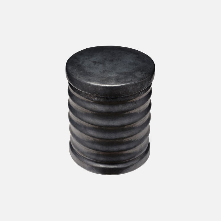Stack of black rubber washers on a white background