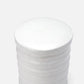 White cylindrical container with a textured surface on a white background
