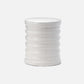 White ceramic vase with textured surface on a white background