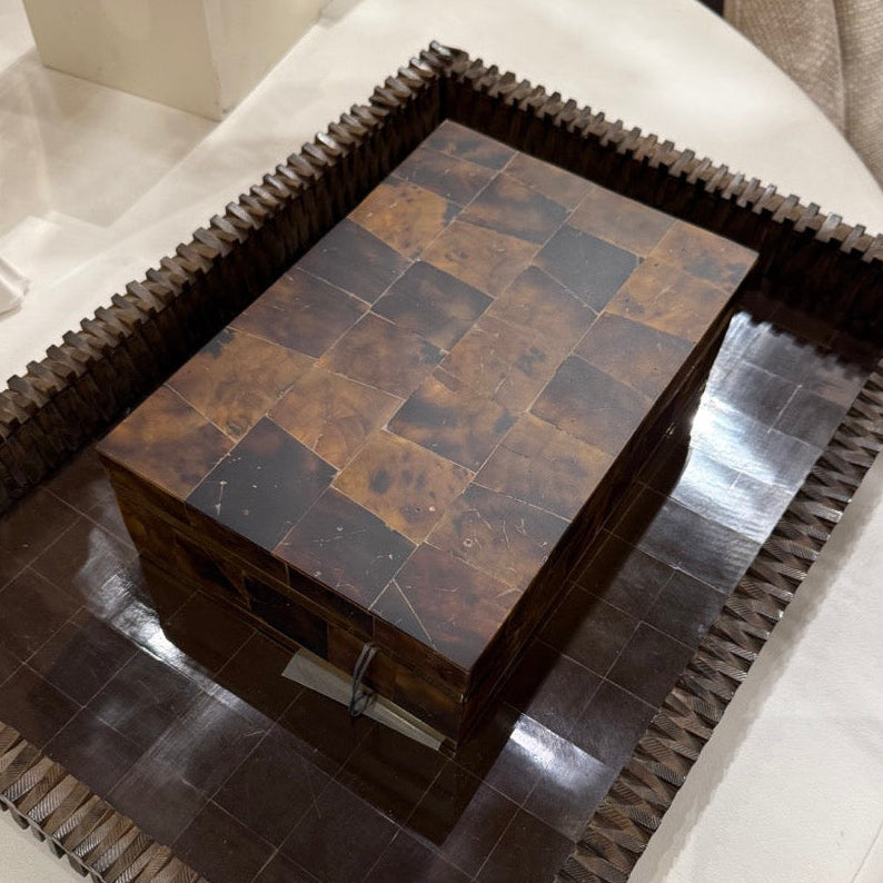 Wooden coffee table with a checkered pattern on a white surface