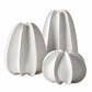 Three ribbed ceramic vases in white and light gray, arranged in a set against a plain white background.