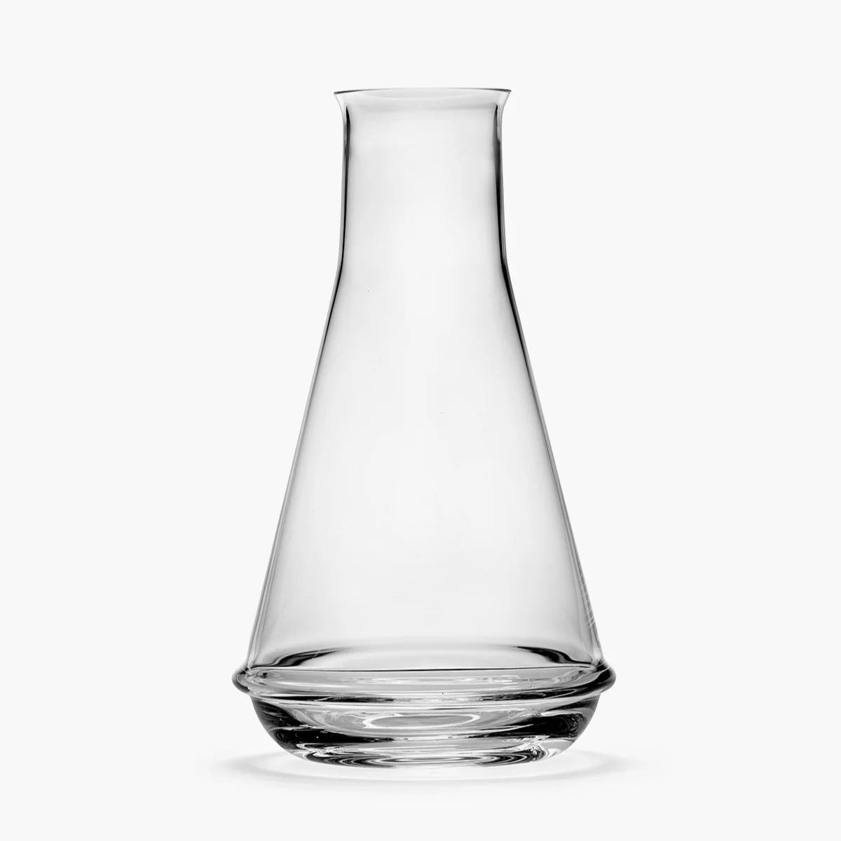 Clear glass carafe on a white background