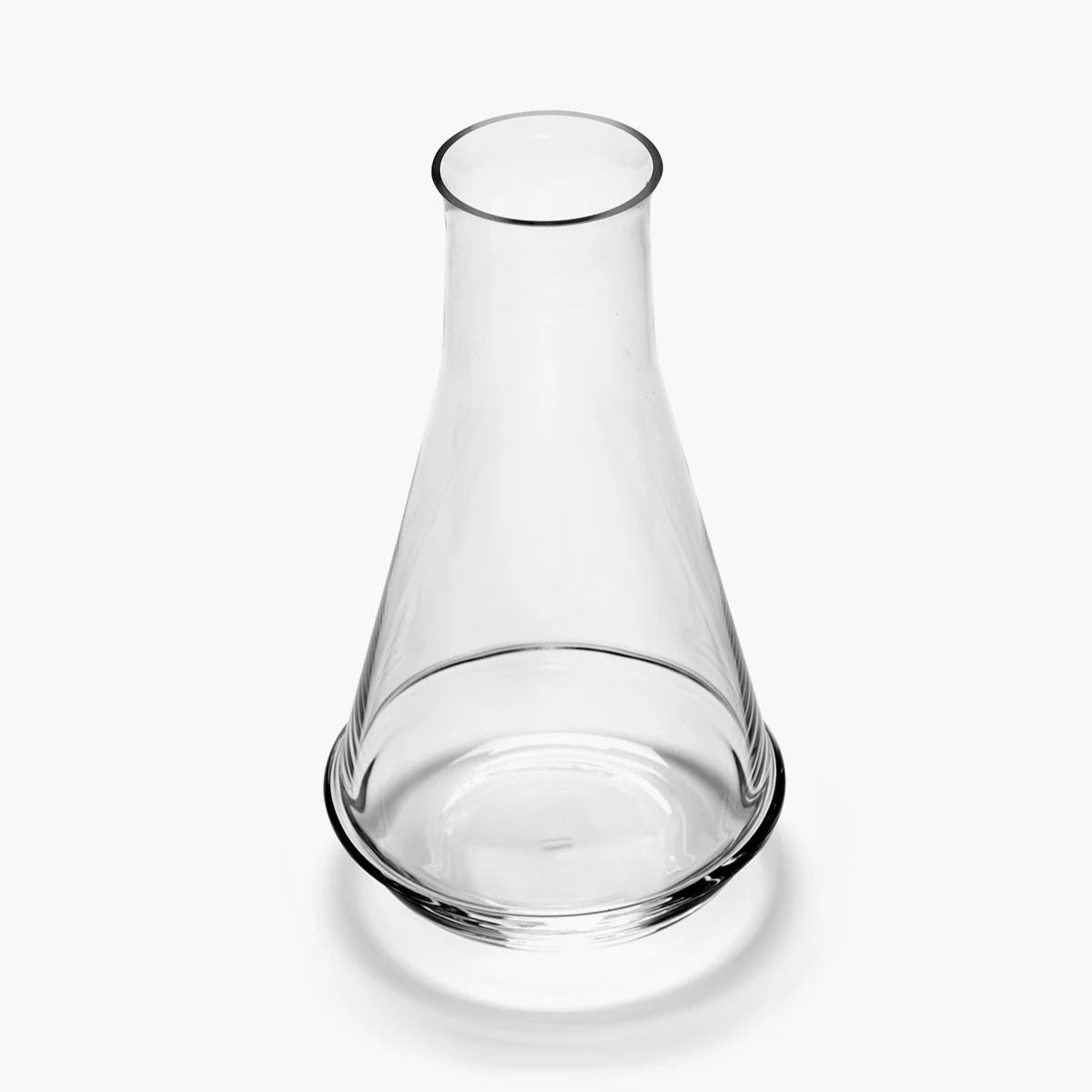 Clear glass carafe on a white background