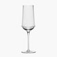 Clear wine glass on a white background