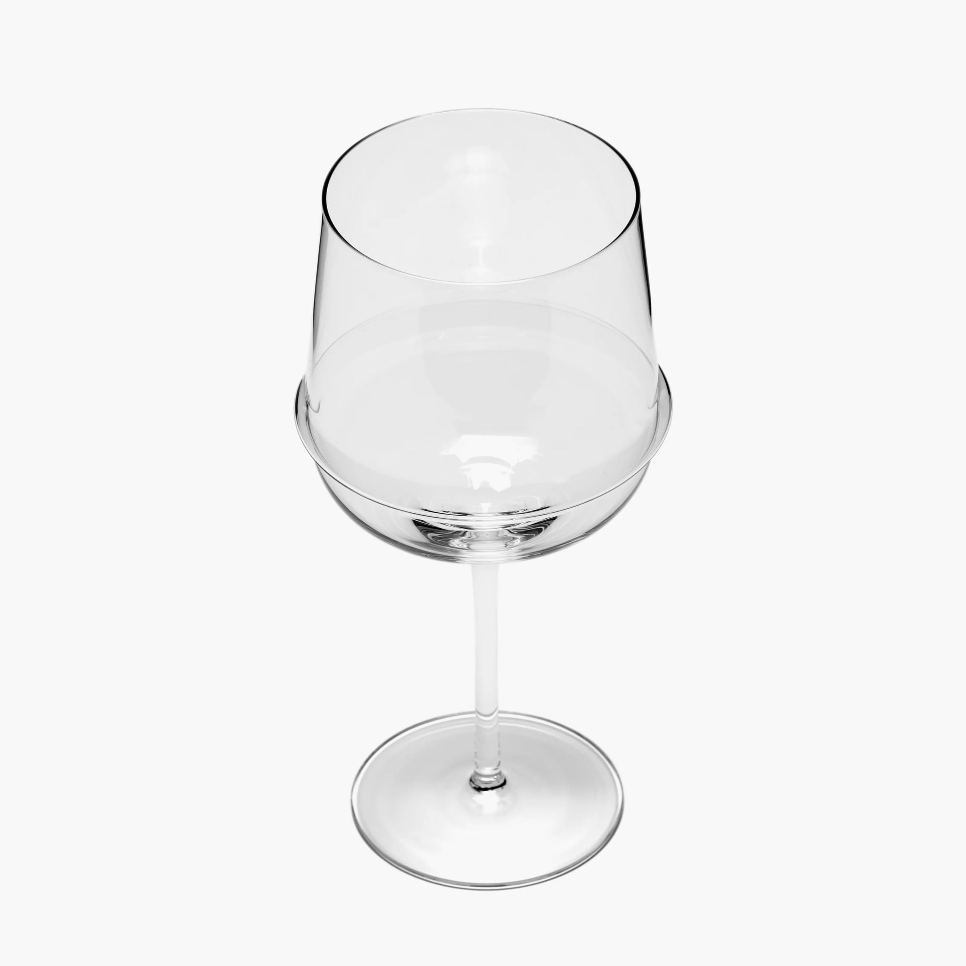 Clear wine glass on a white background