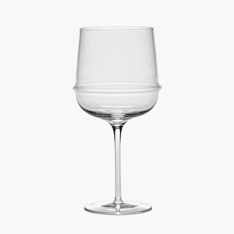 Clear wine glass on a white background