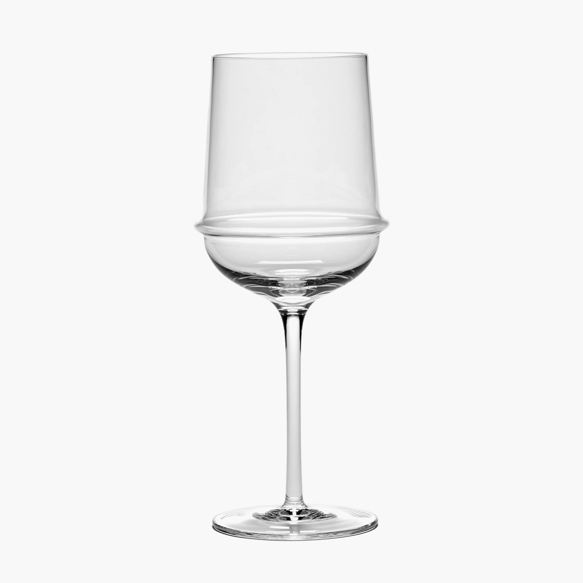 Clear wine glass on a white background