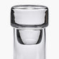 Clear glass tumbler with a white interior on a white background