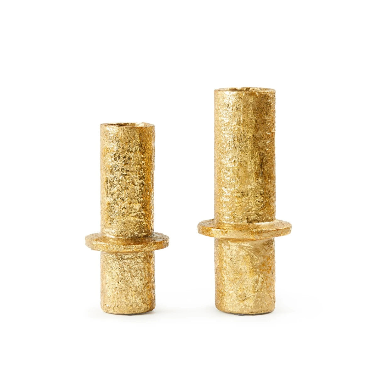 Two gold cylindrical objects on a white background