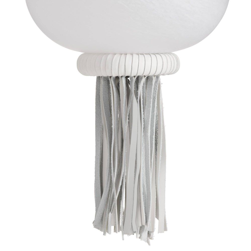 White lamp with tassels on a white background