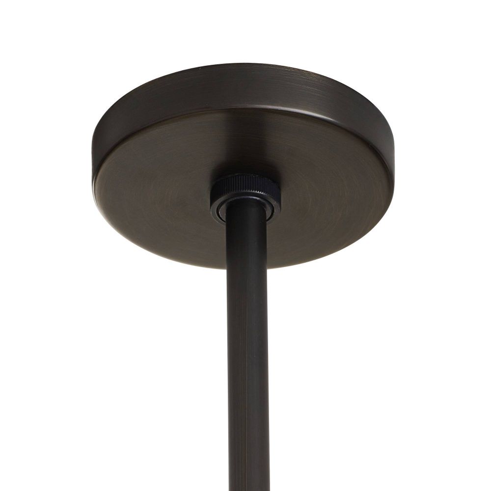 Close-up of a black ceiling light fixture on a white background