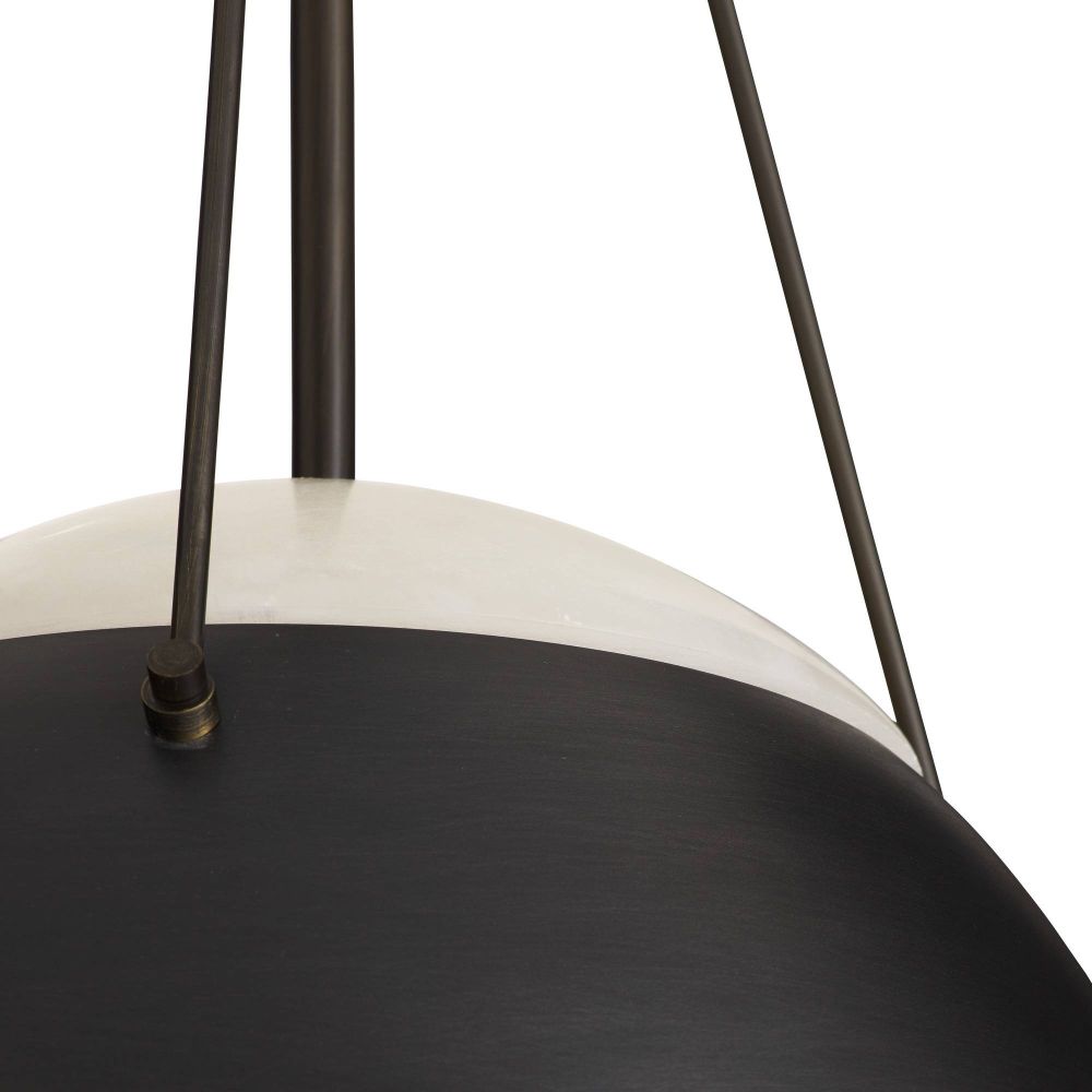 Close-up of a black pendant light with metal suspension on a white background