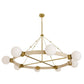 Gold chandelier with white spherical lights on a white background