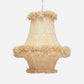 Rattan pendant light with frayed edges on a white background