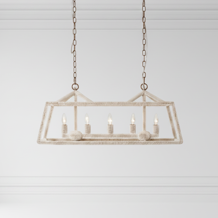 Rectangular pendant light fixture hanging against a white wall