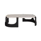 Modern coffee table with white top and black base on a white background