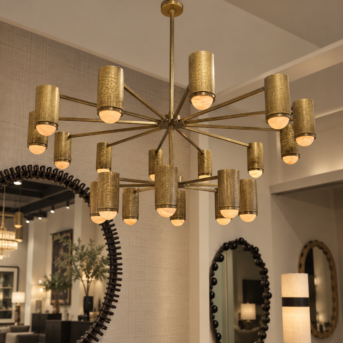 brass and alabaster two tiered chandelier in a showroom