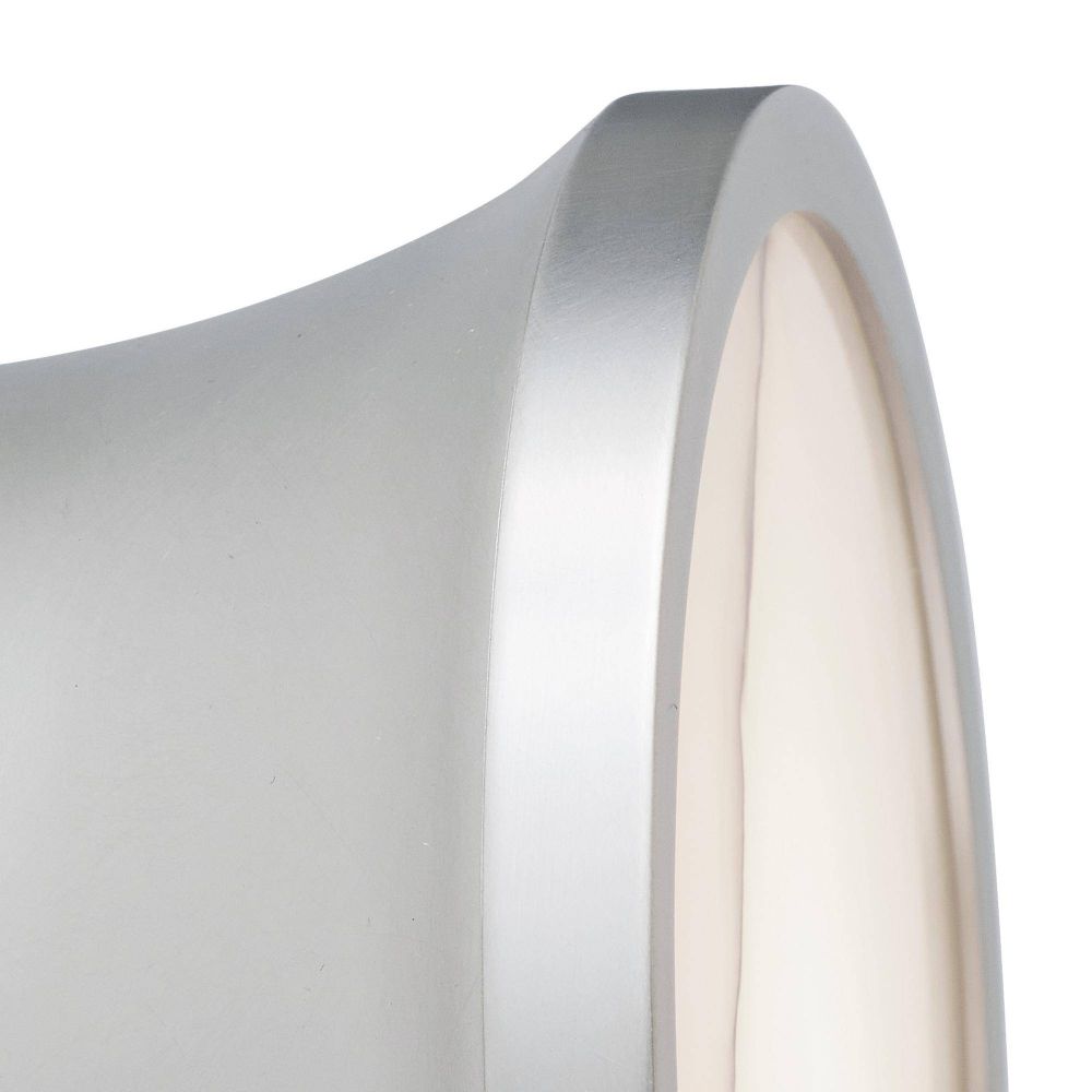 Close-up of a cylindrical object with a metallic band on a white background