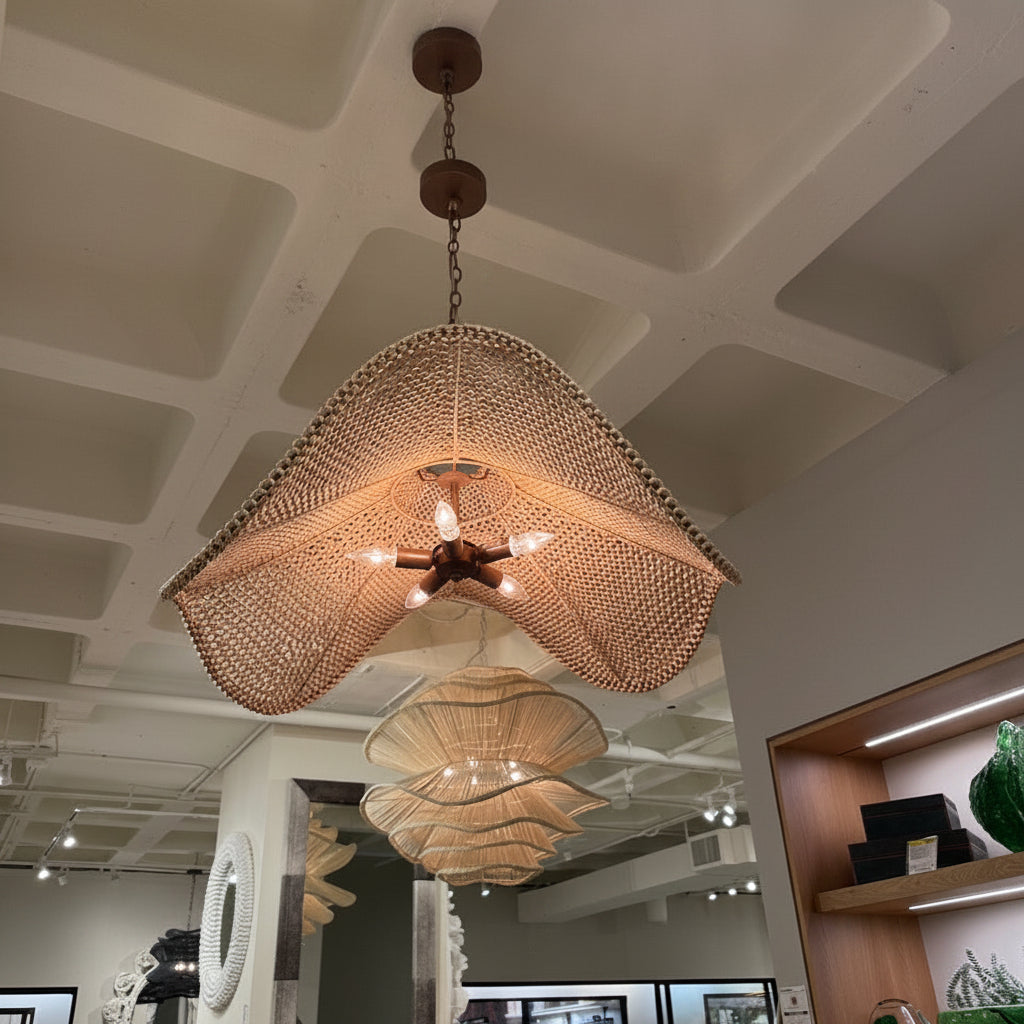 Chandelier hanging from a ceiling in a store setting