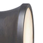 Close-up of a cylindrical wall light fixture with a dark bronze finish.