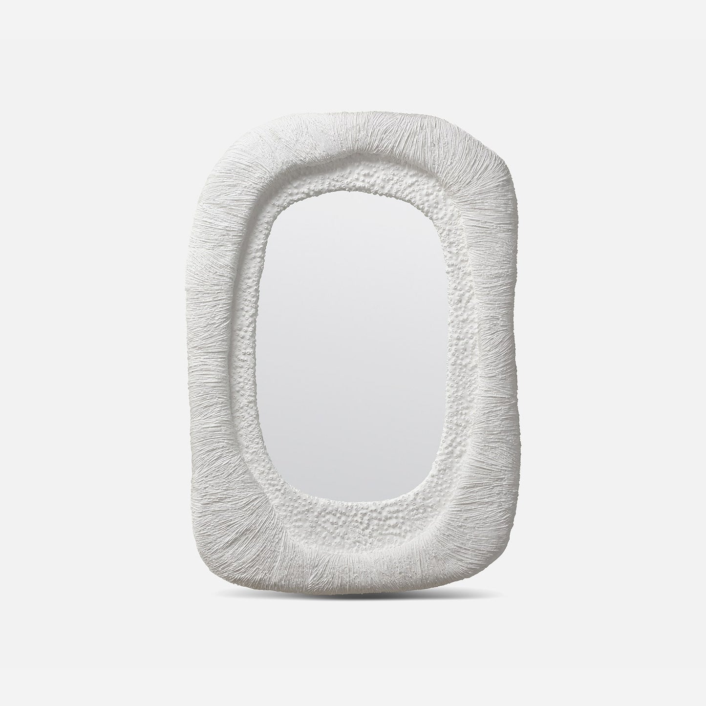 Decorative mirror with textured frame on a white background