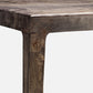 Close-up of a wooden table corner with a white background