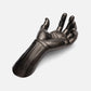Metallic hand sculpture on a white background