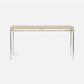 A modern console table featuring a light beige textured fabric top and a silver-toned metal frame with slim legs, shown against a plain white background.