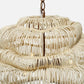 Close-up of a beige woven rattan pendant light against a white background