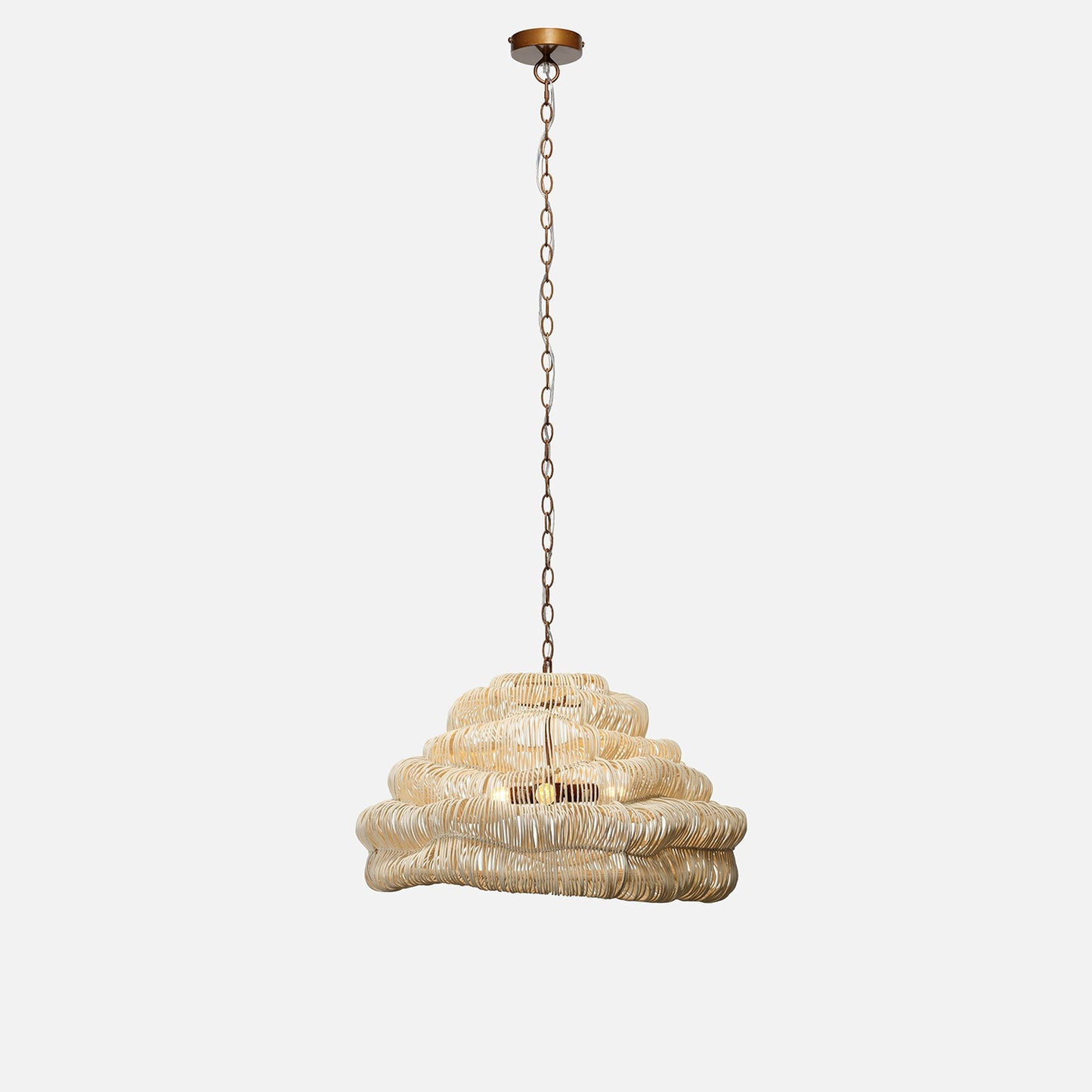 Decorative pendant light with a ribbed design on a white background